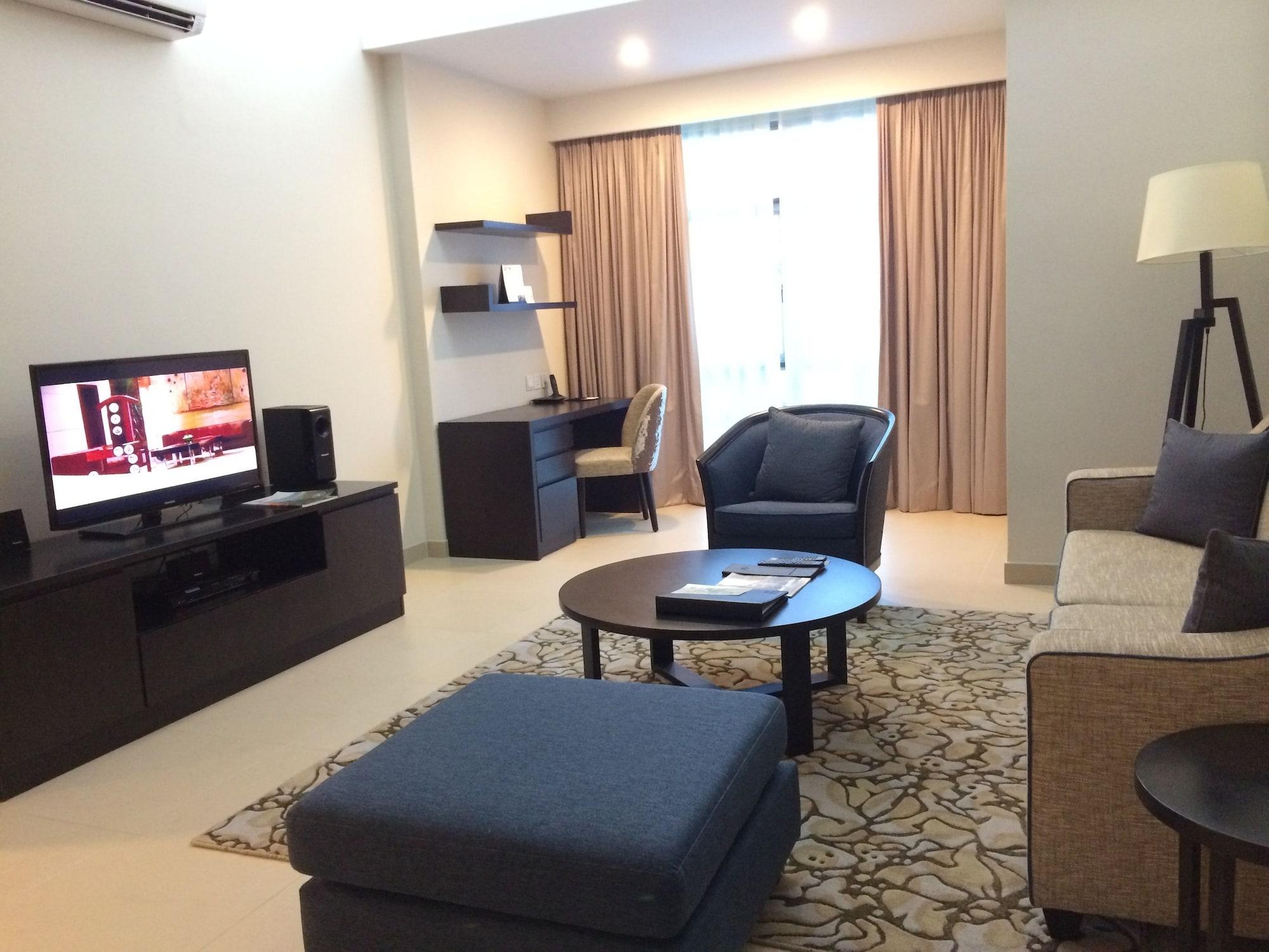 Somerset Hô Chi Minh-Ville Extérieur photo Living room of a suite at the hotel
